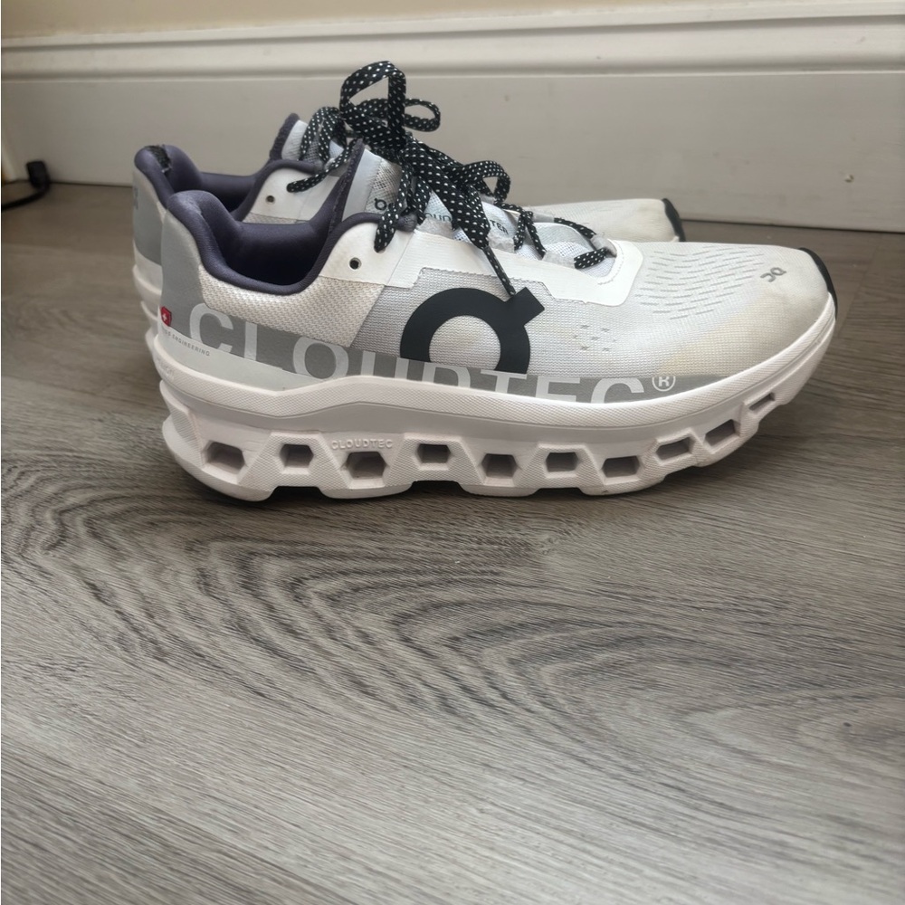 On Running Gray and White Athletic Shoes